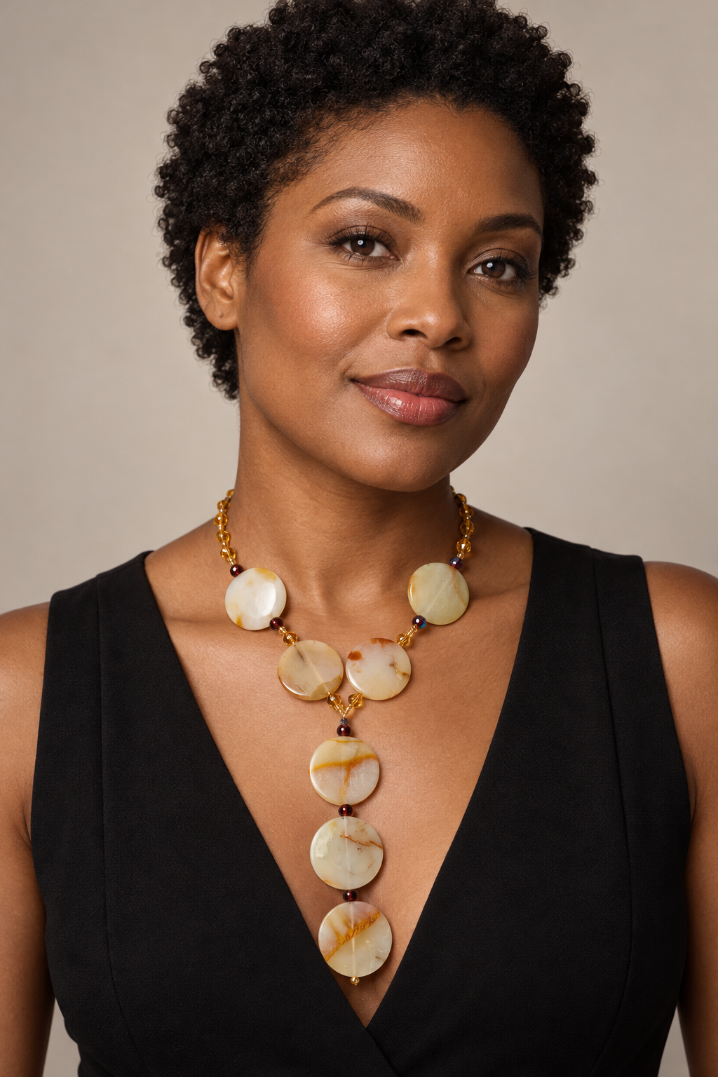 AI generated model wearing D’or YN 186 cream and amber agate disc necklace; necklace and matching earrings sold together.