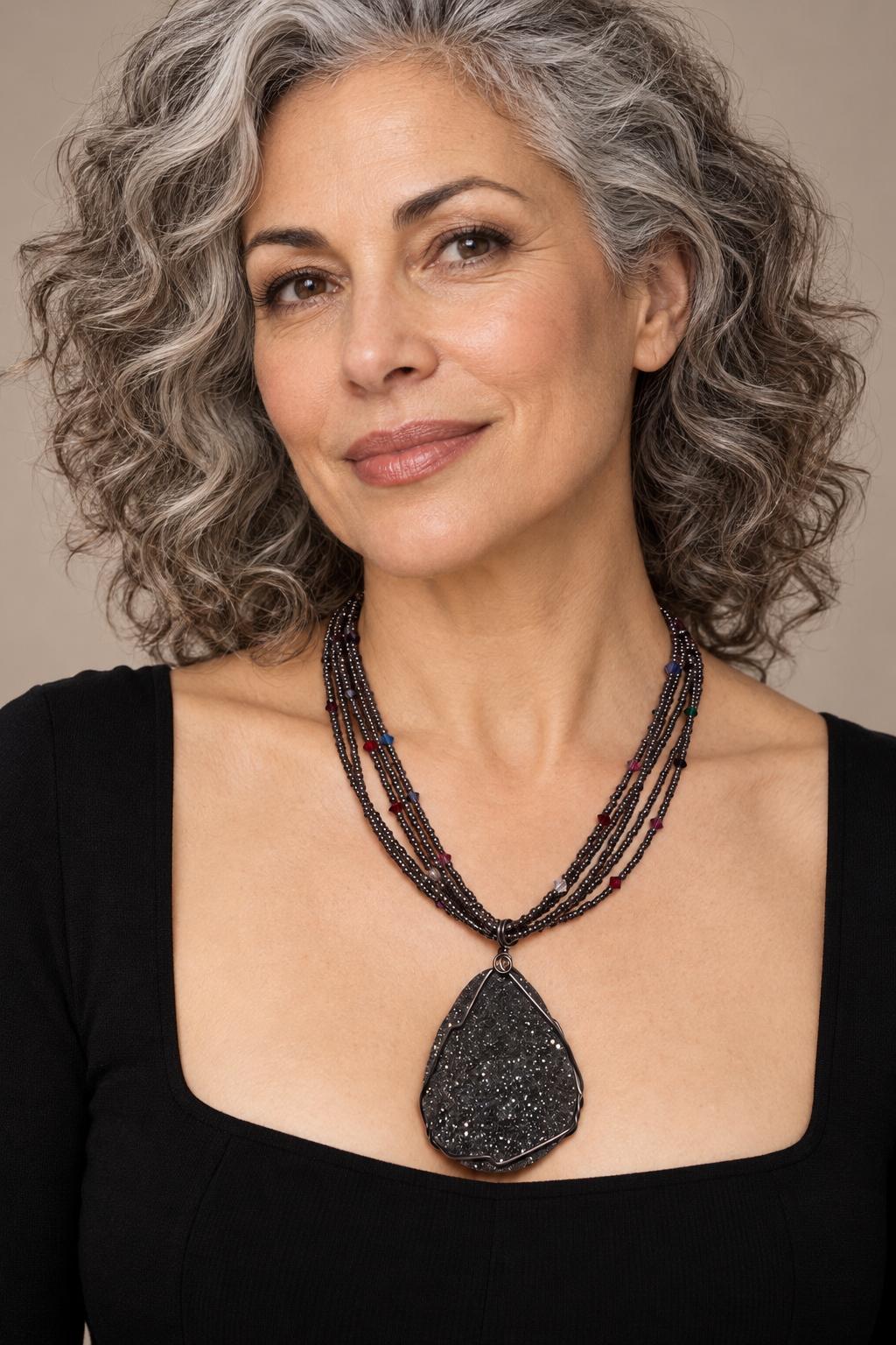 AI generated model wearing D’or PRN 506 dark geode pendant necklace with multiple strands of seed beads and crystal accents.